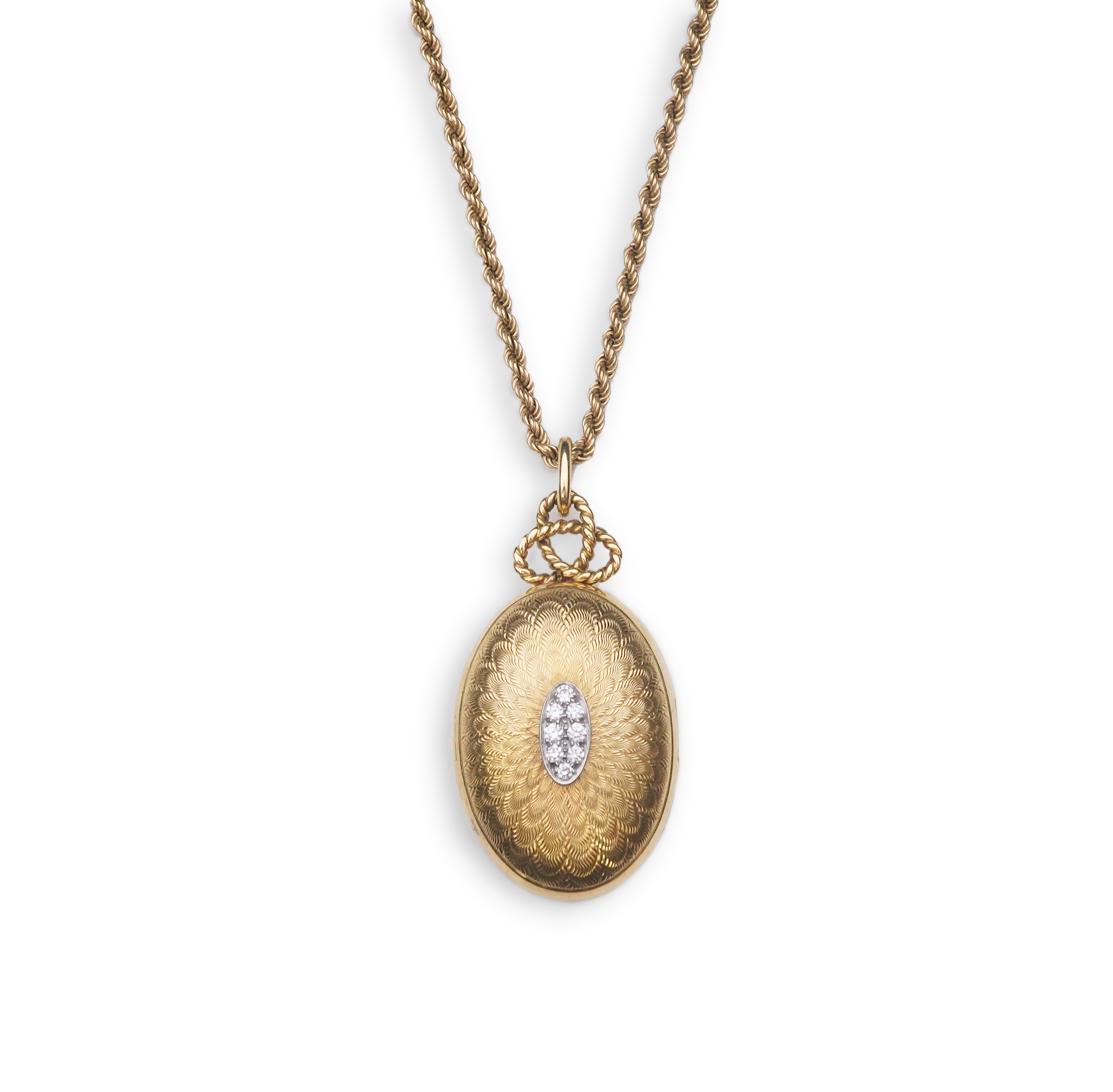 Cartier, an 18ct gold and diamond locket pendant, 1978